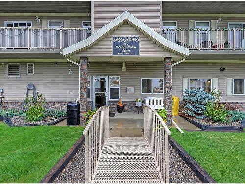 205-400 1 Avenue Se, Diamond Valley, AB - Outdoor With Balcony