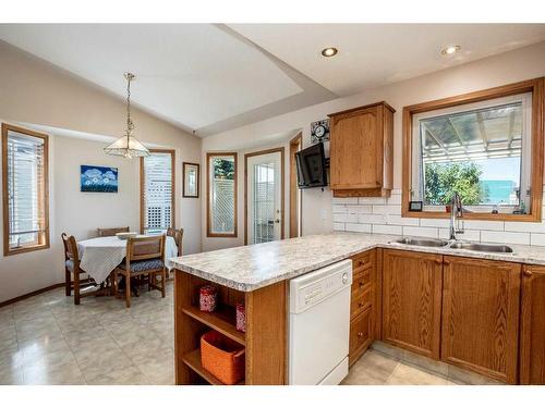 901 Riverside Drive Nw, High River, AB - Indoor Photo Showing Kitchen With Double Sink