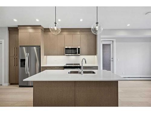 2203-395 Skyview Parkway Ne, Calgary, AB - Indoor Photo Showing Kitchen With Stainless Steel Kitchen With Double Sink With Upgraded Kitchen