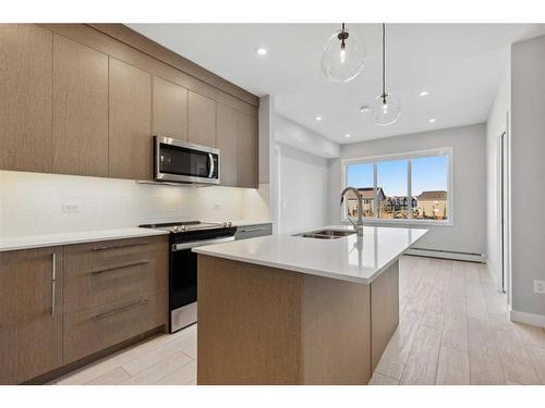 2203-395 Skyview Parkway Ne, Calgary, AB - Indoor Photo Showing Kitchen With Double Sink With Upgraded Kitchen