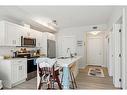 115-500 Auburn Meadows Common Se, Calgary, AB  - Indoor Photo Showing Kitchen With Upgraded Kitchen 