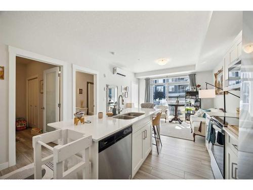 115-500 Auburn Meadows Common Se, Calgary, AB - Indoor Photo Showing Kitchen With Double Sink With Upgraded Kitchen