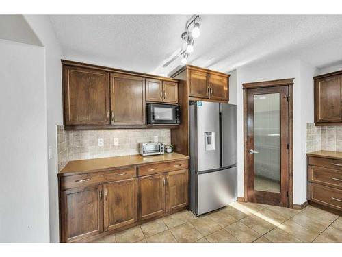 105 Aspenmere Place, Chestermere, AB - Indoor Photo Showing Kitchen