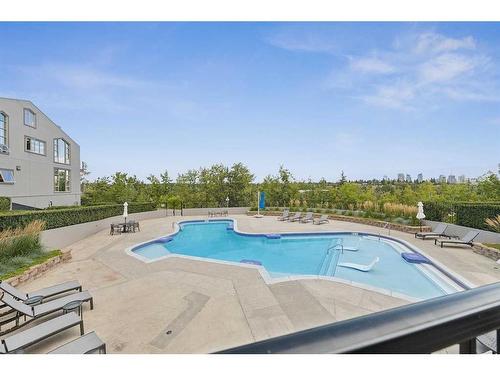 18-3203 Rideau Place Sw, Calgary, AB - Outdoor With In Ground Pool