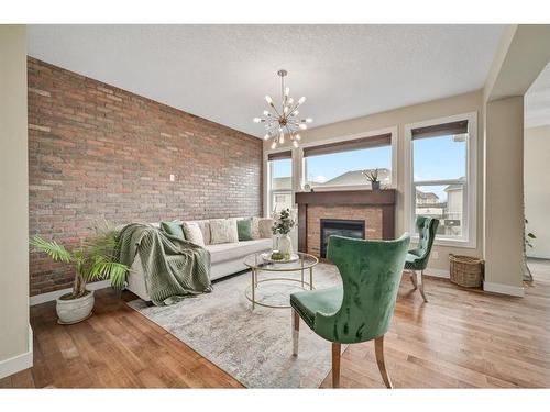 654 Marina Drive, Chestermere, AB - Indoor Photo Showing Living Room With Fireplace