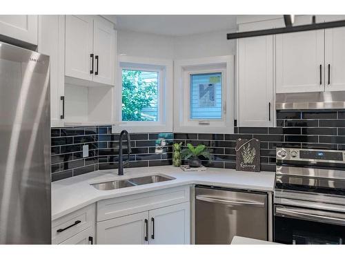 2306 19 Street Ne, Calgary, AB - Indoor Photo Showing Kitchen With Double Sink