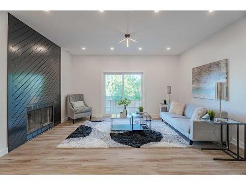 2306 19 Street Ne, Calgary, AB - Indoor Photo Showing Living Room With Fireplace