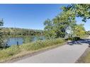 1505-80 Point Mckay Crescent Nw, Calgary, AB  - Outdoor With Body Of Water With View 