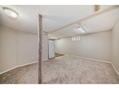 24 Whitaker Close Ne, Calgary, AB - Indoor Photo Showing Other Room