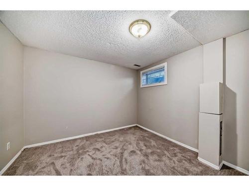 24 Whitaker Close Ne, Calgary, AB - Indoor Photo Showing Other Room