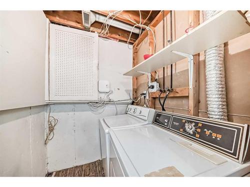 24 Whitaker Close Ne, Calgary, AB - Indoor Photo Showing Laundry Room