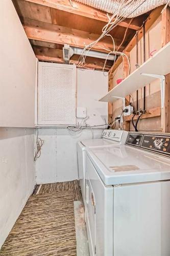 24 Whitaker Close Ne, Calgary, AB - Indoor Photo Showing Laundry Room