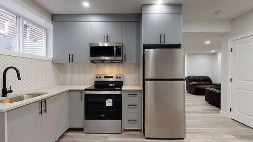 45 Savanna Alley Ne, Calgary, AB - Indoor Photo Showing Kitchen With Stainless Steel Kitchen With Upgraded Kitchen