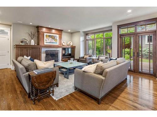 4215 15A Street Sw, Calgary, AB - Indoor Photo Showing Living Room With Fireplace