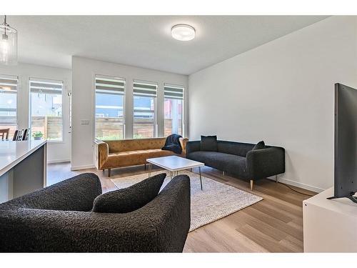 53 Copperhead Road Se, Calgary, AB - Indoor Photo Showing Living Room