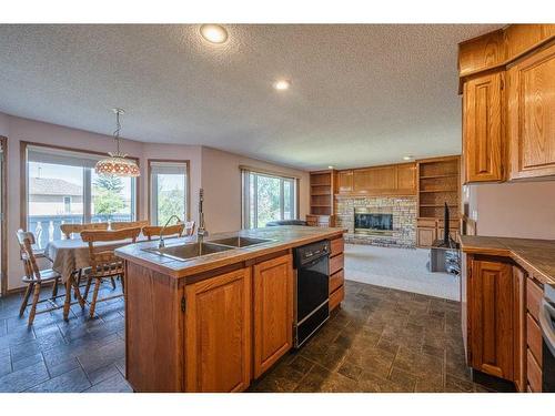 97 Edgebrook Road Nw, Calgary, AB - Indoor Photo Showing Other Room With Fireplace