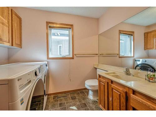 97 Edgebrook Road Nw, Calgary, AB - Indoor Photo Showing Laundry Room