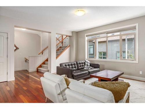 202-1312 Russel Road Ne, Calgary, AB - Indoor Photo Showing Living Room