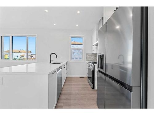 120 Setonstone Manor Se, Calgary, AB - Indoor Photo Showing Kitchen With Stainless Steel Kitchen With Upgraded Kitchen