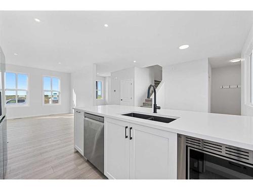 120 Setonstone Manor Se, Calgary, AB - Indoor Photo Showing Kitchen With Double Sink