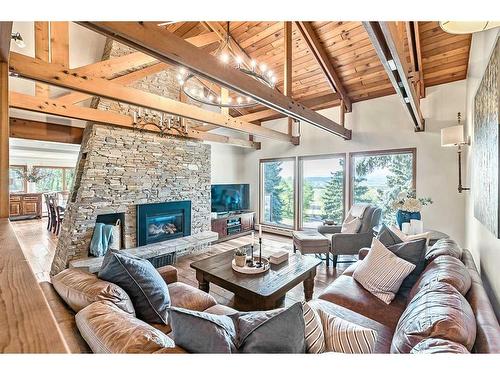 402002 80 Street West, Rural Foothills County, AB - Indoor Photo Showing Living Room With Fireplace