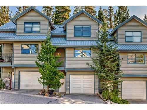 242 Benchlands Terrace, Canmore, AB - Outdoor With Facade