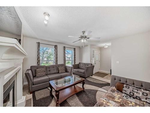 120 Saddlebrook Circle Ne, Calgary, AB - Indoor Photo Showing Living Room