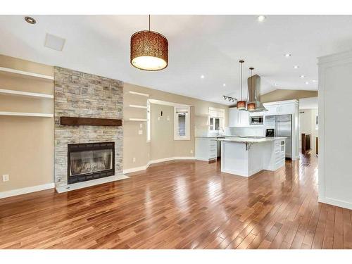 420 Sandstone Place, Okotoks, AB - Indoor With Fireplace