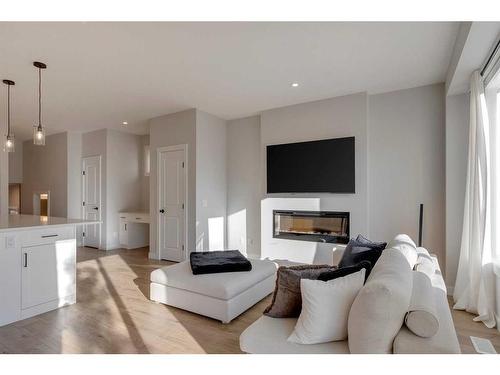 20 Rowley Terrace Nw, Calgary, AB - Indoor Photo Showing Living Room With Fireplace