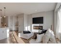 20 Rowley Terrace Nw, Calgary, AB  - Indoor Photo Showing Living Room With Fireplace 