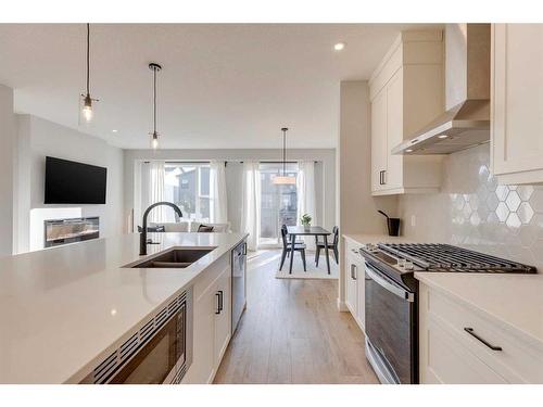 20 Rowley Terrace Nw, Calgary, AB - Indoor Photo Showing Kitchen With Double Sink With Upgraded Kitchen