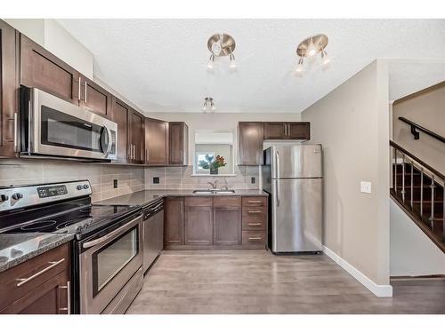 47 Panatella Road Nw, Calgary, AB - Indoor Photo Showing Kitchen With Stainless Steel Kitchen