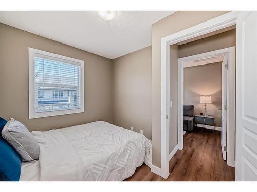 47 Panatella Road Nw, Calgary, AB - Indoor Photo Showing Bedroom