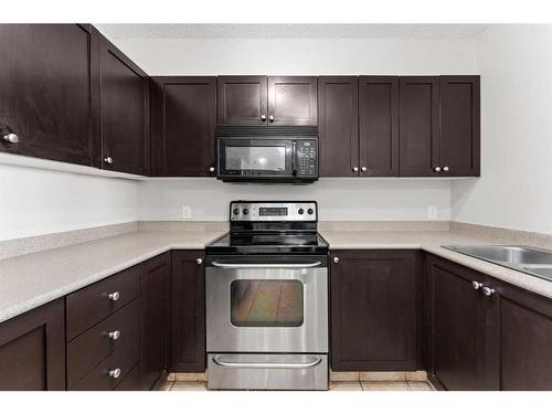 910-1111 6 Avenue Sw, Calgary, AB - Indoor Photo Showing Kitchen