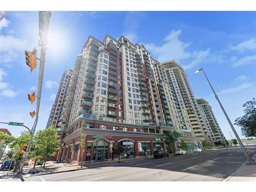 910-1111 6 Avenue Sw, Calgary, AB - Outdoor With Balcony With Facade