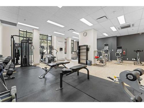 910-1111 6 Avenue Sw, Calgary, AB - Indoor Photo Showing Gym Room