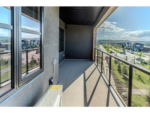 311-125 Wolf Hollow Crescent Se, Calgary, AB - Outdoor With Balcony With View With Exterior