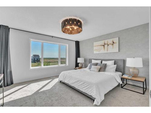 18 Savoy Landing Se, Calgary, AB - Indoor Photo Showing Bedroom