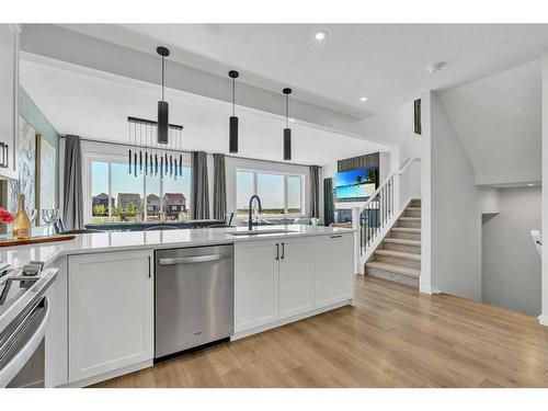 18 Savoy Landing Se, Calgary, AB - Indoor Photo Showing Kitchen With Upgraded Kitchen