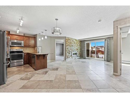 1106-450 Sage Valley Drive Nw, Calgary, AB - Indoor Photo Showing Kitchen