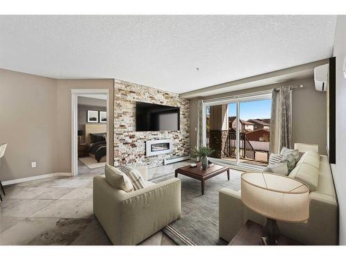 1106-450 Sage Valley Drive Nw, Calgary, AB - Indoor Photo Showing Living Room