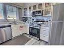 4801 45 Street, St. Paul, AB  - Indoor Photo Showing Kitchen With Double Sink 