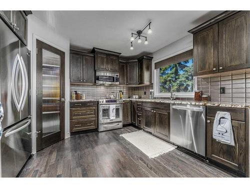 50 Hampstead Circle Nw, Calgary, AB - Indoor Photo Showing Kitchen With Upgraded Kitchen