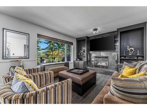 50 Hampstead Circle Nw, Calgary, AB - Indoor Photo Showing Living Room With Fireplace