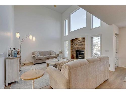 9 Cranwell Place Se, Calgary, AB - Indoor Photo Showing Living Room With Fireplace