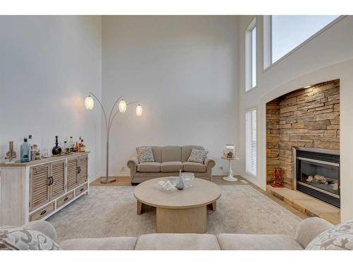 9 Cranwell Place Se, Calgary, AB - Indoor Photo Showing Living Room With Fireplace