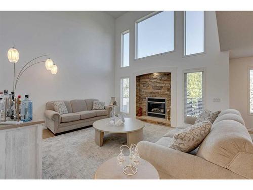 9 Cranwell Place Se, Calgary, AB - Indoor Photo Showing Living Room With Fireplace