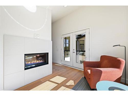 2603 14 Avenue Nw, Calgary, AB - Indoor Photo Showing Living Room With Fireplace