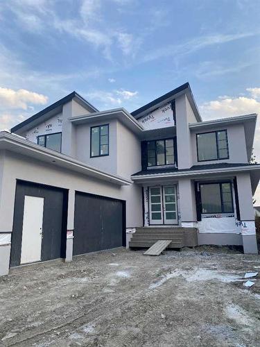 61 Rockcliff Terrace Nw, Calgary, AB - Outdoor With Facade