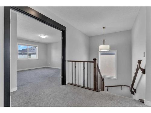 109 Kinniburgh Cove, Chestermere, AB - Indoor Photo Showing Other Room